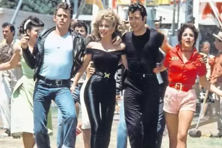 Zum Mitsingen: der 70er-Jahre-Tanzfilm „Grease“ mit John Travolta und Olivia Newton-John als Kino-Karaoke-Version