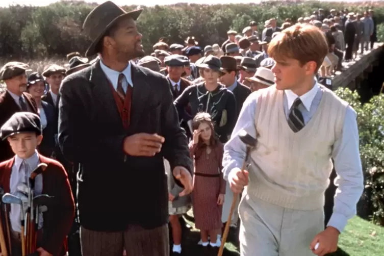 Matt Damon (rechts) entdeckt durch Caddy Will Smith in &bdquo;Die Legende von Bagger Vance&ldquo; seine Liebe zum Golfsport wieder. 