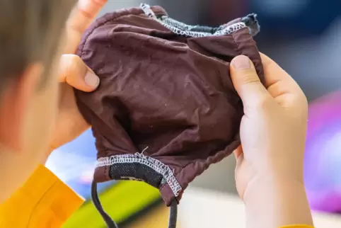 Mundschutz soll gegen die Verbreitung von Corona helfen. 