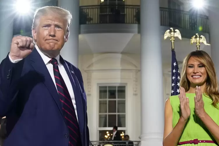 Ich werde es allen zeigen, scheint Donald Trump (hier mit seiner Frau Melania) mit seiner Geste sagen zu wollen.