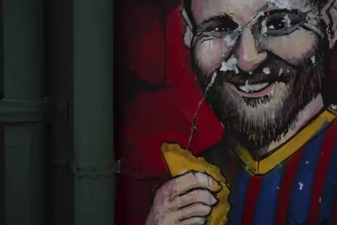 Messi, als Bild an einer Wand.