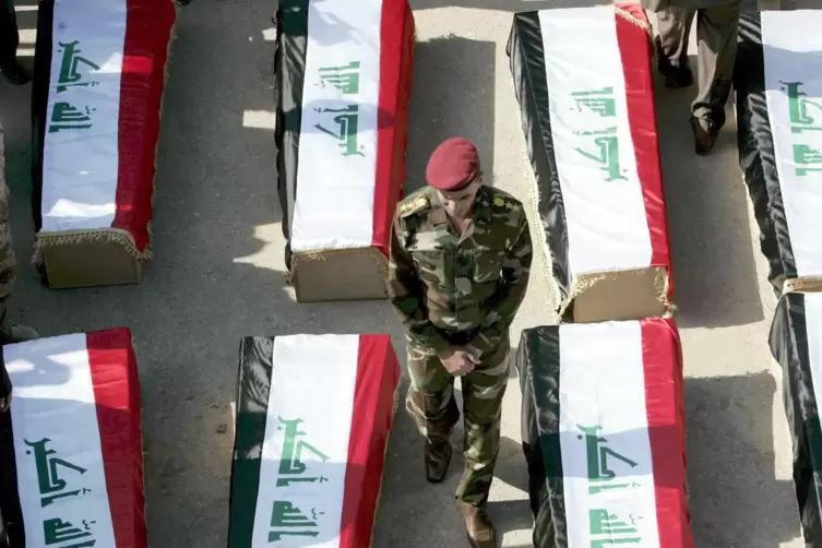 Trauma: 2008 tauschten Iran und Irak die sterblichen Überreste von Gefallenen des 20 Jahre zuvor beendeten Kriegs aus.