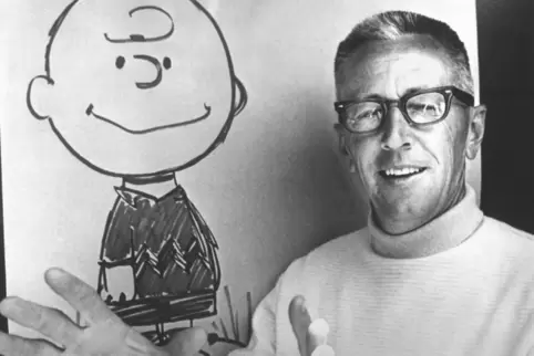 Peanuts-Erfinder Chalers M. Schulz mit Charlie Brown. 