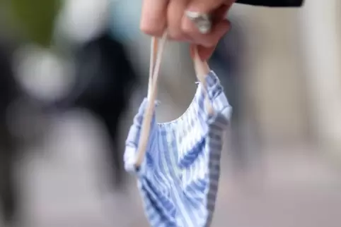 Umstritten: Maskenpflicht. Umstritten: Maskenpflicht.