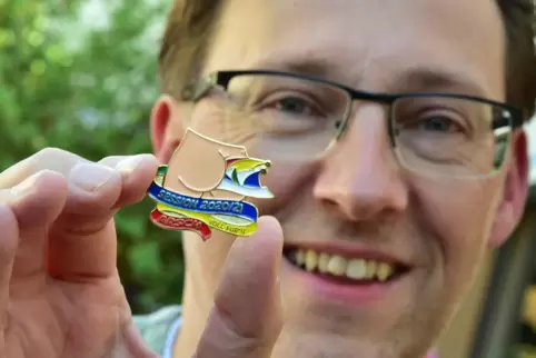 „Voll für’n A...“ lautet das Motto auf Jörg Fischs erfolgreichem Pin.