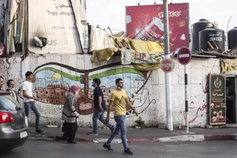 Strassenszene in Ramallah: Wandmalereien erinnern daran, dass (Ost-) Jerusalem Hauptstadt eines Palästinenserstaates werden soll