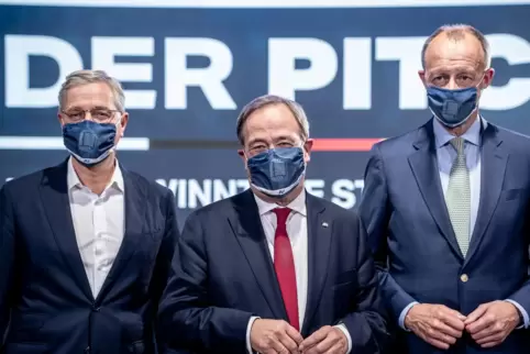 Die drei Kandidaten für den Bundesvorsitz der CDU, Armin Laschet (Mitte), Friedrich Merz (rechts) und Norbert Röttgen (links).