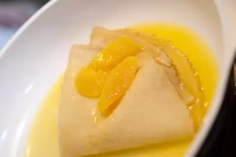 Eine von vielen beliebten Crêpes-Varianten: Suzette mit Orangensoße.