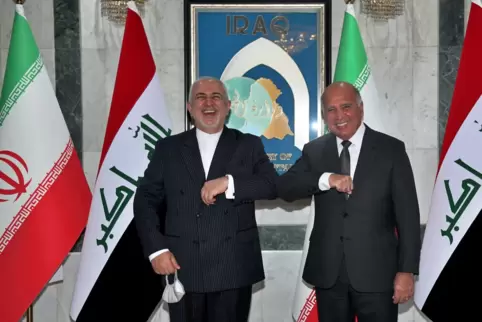 Immer im Dienste seines Landes unterwegs: Dschawad Sarif, hier links im Bild, daneben sein irakischer Amtskollege Fuad Hussein.