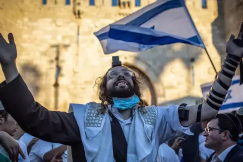 Die Koalition mit der arabischen Partei sollte mit dem „Flaggenmarsch“ erschüttert werden, vermuten einige Israelis. 