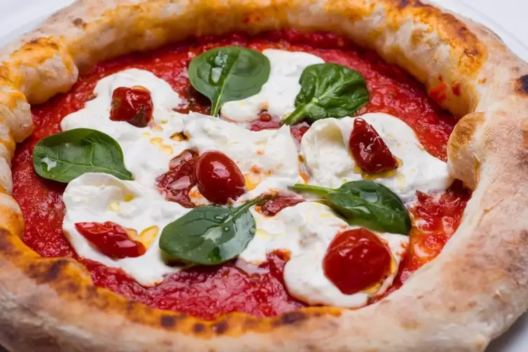 Nicht wegzudenken: Tomaten auf der Pizza, hier die klassische Margherita. 