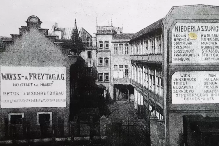 Das Foto zeigt die Firmenzentrale von Wayss & Freytag in der Talstraße 11 von der Bahnseite aus. Die Inschrift rechts listet sto
