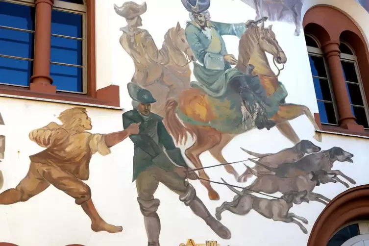 Das historische Ereignis ist als buntes Tableau samt J&auml;gern mit einer Hundemeute dargestellt. 