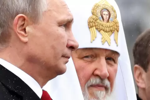 Ziemlich gute Freunde: Kyrill I., der Patriarch der russisch-orthodoxen Kirche in Moskau, versucht immer wieder , den Angriff Wl