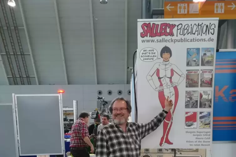 Verleger Schott an seinem Stand auf dem Comic-Salon in Erlangen 2018.
