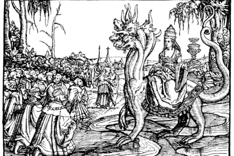 Kritik am Papsttum in der Luther-Bibel von 1545: Die „Hure Babylon“ trägt die Tiara, die Papstkrone. 