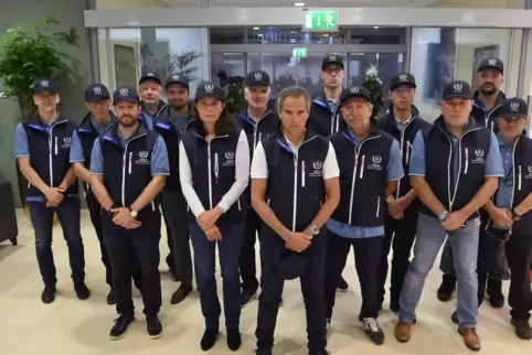 Gruppenfoto der IAEA-Fachleute mit ihrem selbstbewussten Chef Mariano Grossi vorn in der Mitte. 