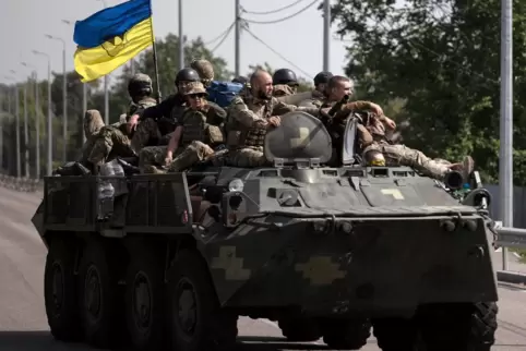 Den Widerstand gegen Russland, hier ukrainische Soldaten, sehen Kritiker durch das Werk eines australischen Künstlers delegitimi