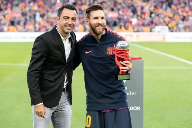 Xavi (links) und Lionel Messi