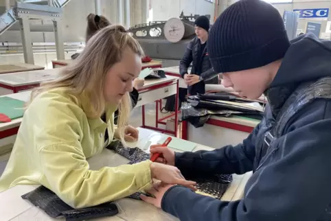 Bei der Schuhausbildungsmesse wirbt die Fachschule um neue Schüler.