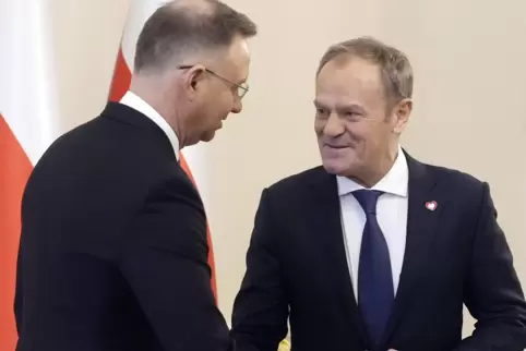 Vergiftetes Lächeln: Polens Präsident Andrzej Duda (links) und der neue Regierungschef Donald Tusk.