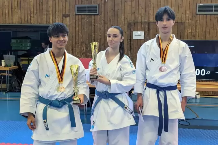 Sebastian Becker, Nadine Poh und Alexander Koch (von links) vom Budokan nach dem Turnier in Heusweiler. 