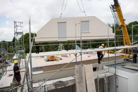 Die künftige Bundesregierung aus Union und SPD will den Neubau von Wohnimmobilien forcieren. 