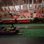 11250754_10_1 TRIX-Anlage mit Dampf-Personenzug, 2 Güterzüge, ADLER-Zug (defekt), 2 große Schienenkreise, elektr. Weichen, Kreuzungen, 2 Trafo