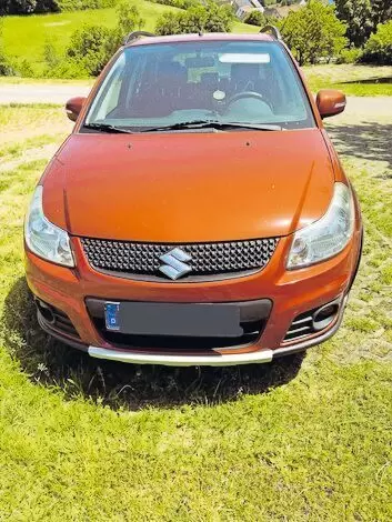 Allrad, AHK, 8-fach bereift, TÜV März 2026 neu, NAVI, Sitzheizung, rot metallic, Fahrzeug gepflegt, aus 2. Hand mit diversen Lac
