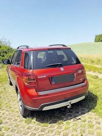 11253394_10_1 Allrad, AHK, 8-fach bereift, TÜV März 2026 neu, NAVI, Sitzheizung, rot metallic, Fahrzeug gepflegt, aus 2. Hand mit diversen Lac
