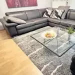 11254650_10_1 Dickledercouch Farbe Schiefer, 6*Kopfteilverstellung, gepflegter guter Zustand, Schenkelmaße 274 cm x 282 cm, Sitzhöhe 41 cm; ma