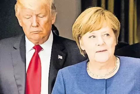 Offene Klimafragen: Donald Trump und Angela Merkel gestern Abend in Hamburg.