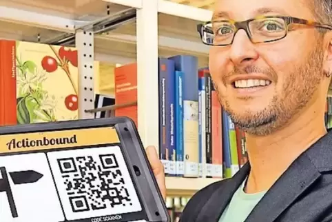 Start des Spiels: Daniel Fromme öffnet die App für die Rallye.