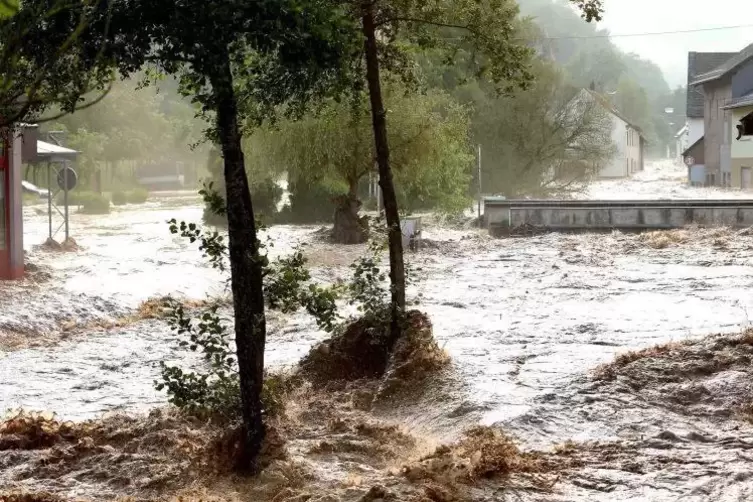 Überflutung nach heftigen Regenfällen. Foto: dpa 