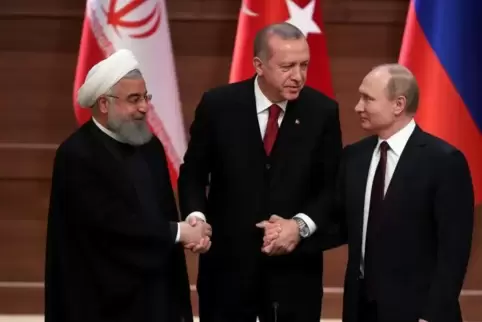 Hassan Ruhani, Recep Tayyip Erdogan und Wladimir Putin (v.l.): Die Präsidenten Irans, der Türkei und Russlands demonstrierten 20